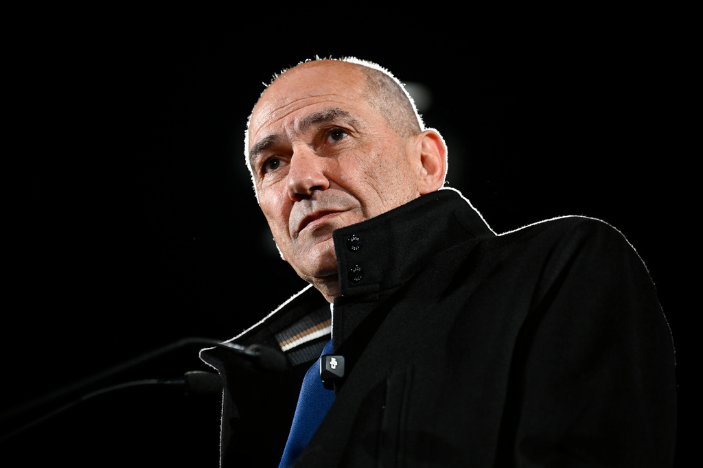 FILE - Former Prime Minister of Slovenia Janez Jansa addresses the media at his election headquarters in Ljubljana, Slovenia, March 22, 2026. (AP Photo/Denes Erdos, file)