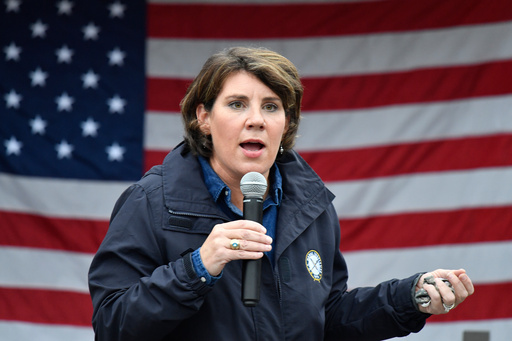 FILE - Democratic candidate for U.S. Senate Amy McGrath speaks to supporters during a rally in Danville, Ky., Oct. 28, 2020. (AP Photo/Timothy D. Easley, File) FILE - Democratic candidate for U.S. Senate Amy McGrath speaks to supporters during a rally in Danville, Ky., Oct. 28, 2020. (AP Photo/Timothy D. Easley, File)
