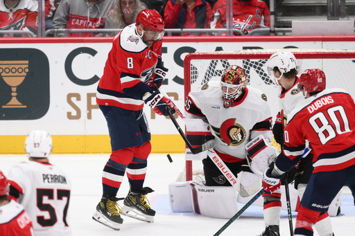 Washington Capitals left wing Alex Ovechkin (8) tries to get the puck past Ottawa Senators goaltender Linus Ullmark (35) during the third period of an NHL hockey game, Saturday, Oct. 25, 2025, in Washington. (AP Photo/Nick Wass) Washington Capitals left wing Alex Ovechkin (8) tries to get the puck past Ottawa Senators goaltender Linus Ullmark (35) during the third period of an NHL hockey game, Saturday, Oct. 25, 2025, in Washington. (AP Photo/Nick Wass)