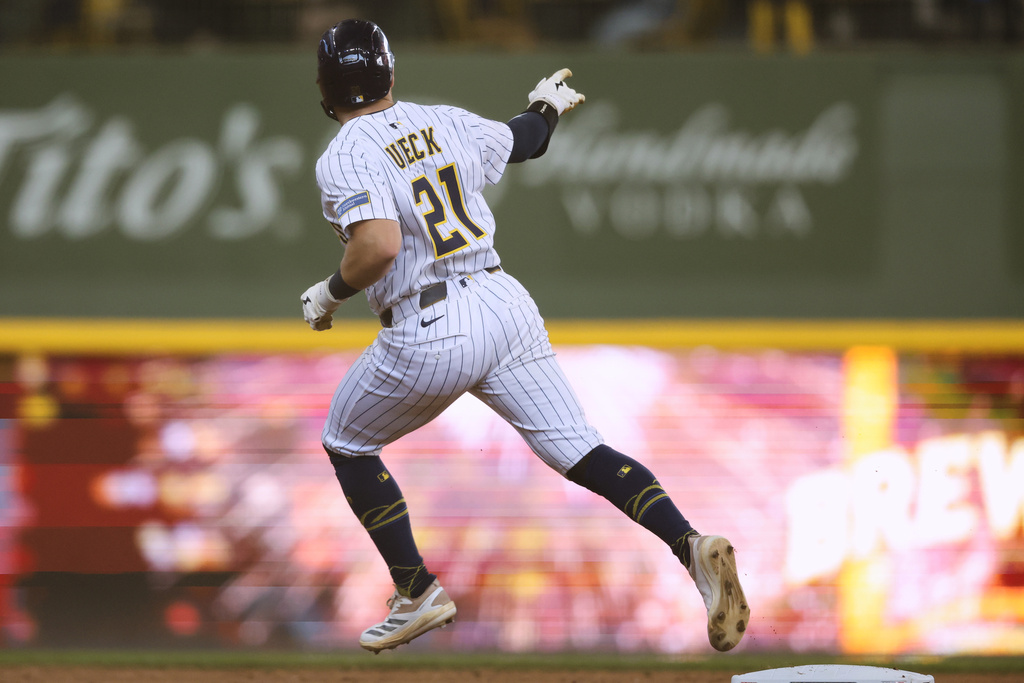 Milwaukee Brewers' Caleb Durbin runs the bases on his home run during the fifth inning of a baseball game against the San Francisco Giants, Sunday, Aug. 24, 2025, in Milwaukee. (AP Photo/Jeffrey Phelps)