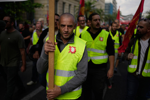 Protesters take part in a nationwide 24-hour strike in Athens, Greece, Wednesday, Oct. 1, 2025, as labor unions demand higher wages and the withdrawal of a bill changing work hours. (AP Photo/Thanassis Stavrakis) Protesters take part in a nationwide 24-hour strike in Athens, Greece, Wednesday, Oct. 1, 2025, as labor unions demand higher wages and the withdrawal of a bill changing work hours. (AP Photo/Thanassis Stavrakis)