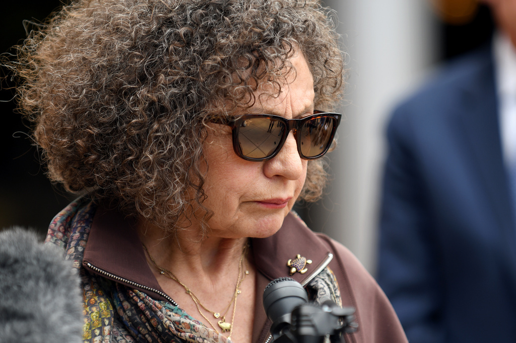 Rachelle Halpern, who witnessed a firebombing attack in 2025, attends a news conference following the suspect's sentencing in Boulder, Colo., on Thursday, May 7, 2026. (AP Photo/Thomas Peipert)