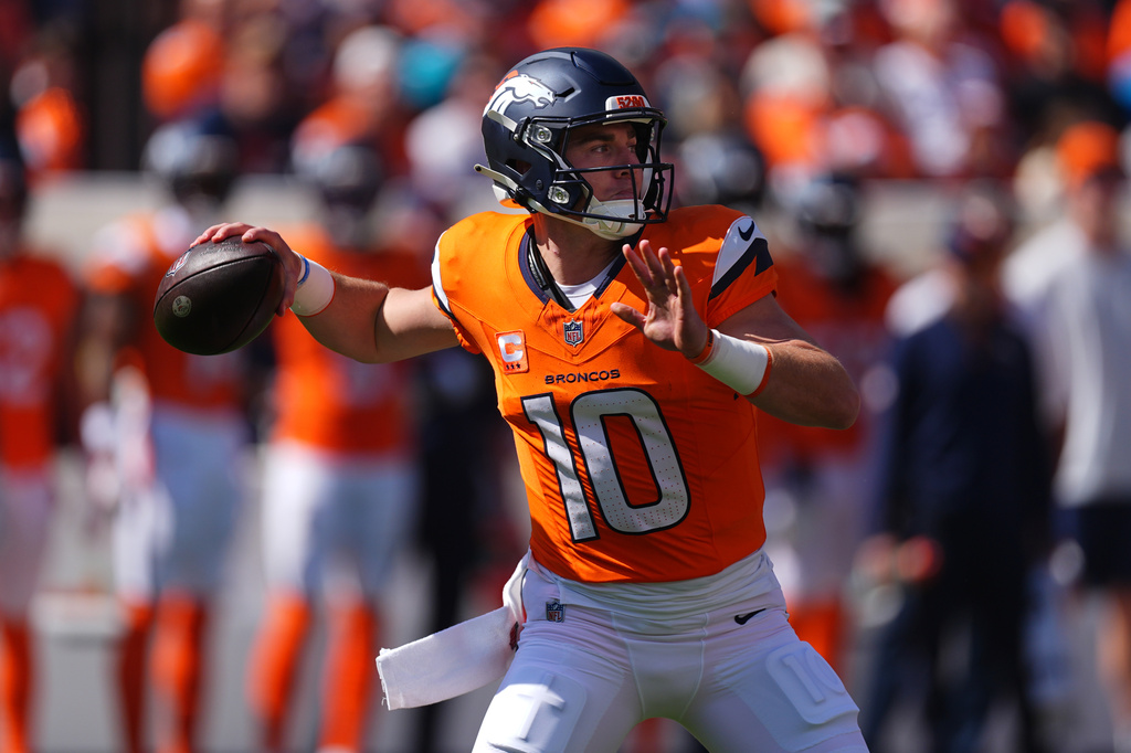 Denver Broncos quarterback Bo Nix passes against the Jacksonville Jaguars in the first half of an NFL football game in Denver, Sunday, Sept. 20, 2026. (AP Photo/David Zalubowski)
