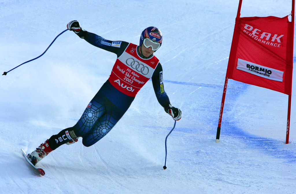 FILE - Bode Miller of the United States makes a turn on one ski during the Downhill portion of the Men's Combined at the World Alpine Ski Championships in Bormio, Italy, Feb. 3, 2005. (AP Photo/Diether Endlicher, File)