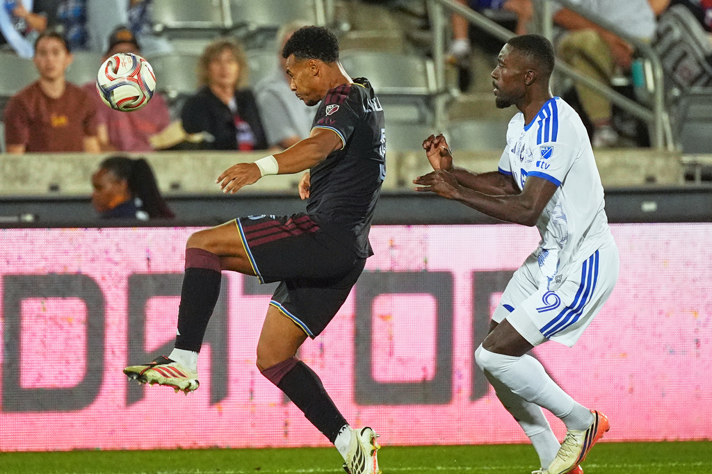 Colorado Rapids defender Loïc Williams, left, collects the ball as CF Montréal forward Prince Owusu, right, defends in the first half of an MLS soccer match Saturday, Sept. 12, 2026, in Commerce City, Colo. (AP Photo/David Zalubowski)