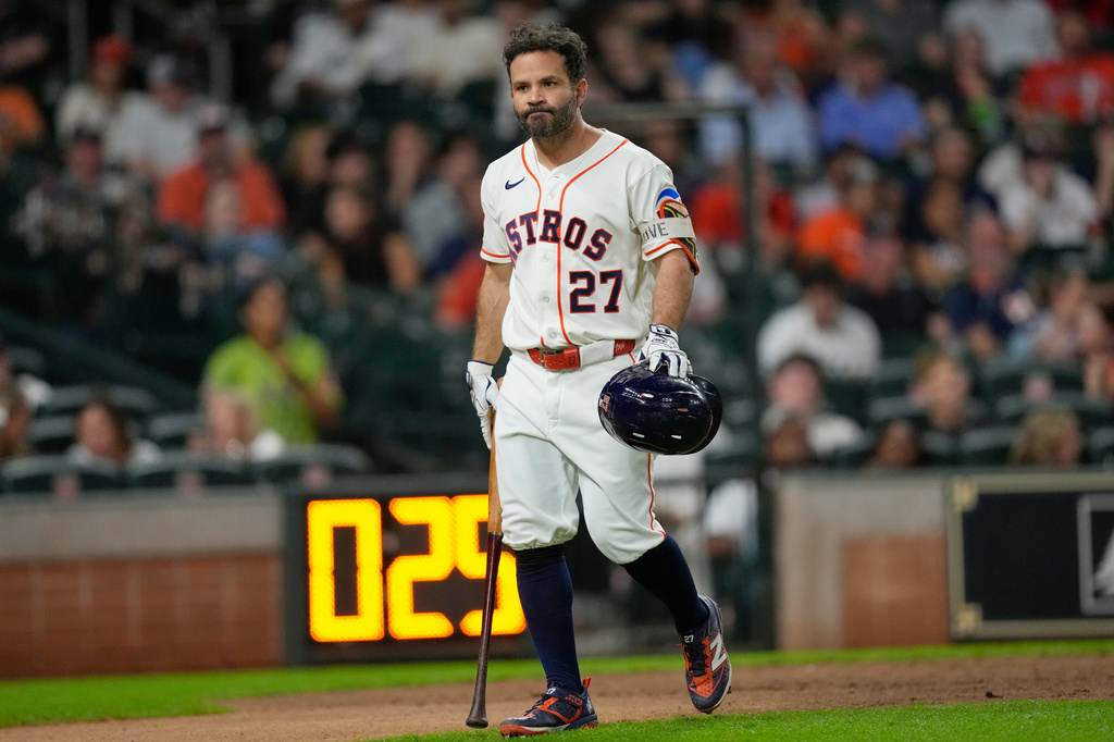 Houston Astros' Jose Altuve walks back to the dugout after striking out against the Chicago White Sox during the sixth inning of a baseball game Tuesday, Sept. 1, 2026, in Houston. (AP Photo/David J. Phillip)