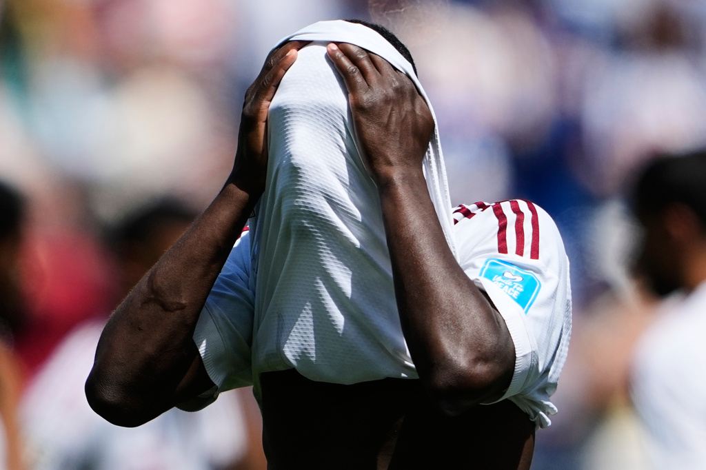 Qatar's Almoez Ali reacts after his team's loss to Bosnia in the World Cup Group B soccer match in Seattle, Wednesday, June 24, 2026. (AP Photo/Lindsey Wasson)