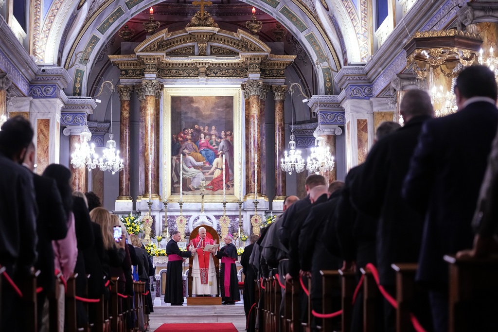 Pope Leo XIV delivers his speech as he meets the clergy at the Cathedral of the Holy Spirit, in Istanbul, Turkey, Friday, Nov. 28, 2025. (AP Photo/Domenico Stinellis)