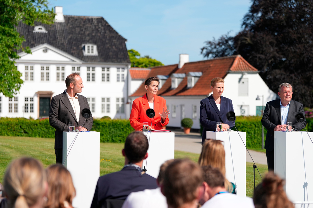 Party leaders Martin Lidegaard (The Social Liberal Party), Pia Olsen Dyhr (SF), incoming Prime Minister Mette Frederiksen (Social Democrats), and Lars Loekke Rasmussen (Moderates) present the government platform for a new government in Denmark, at Marienborg in Kongens Lyngby, Tuesday, June 2, 2026. (Mads Claus Rasmussen/Ritzau Scanpix via AP)