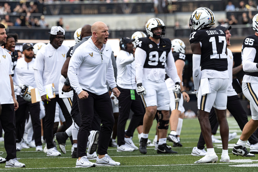 Vanderbilt head coach Clark Lea reacts to his defense making a goal line stand during the second half of an NCAA college football game against Missouri, Saturday, Oct. 25, 2025, in Nashville, Tenn. (AP Photo/Wade Payne)