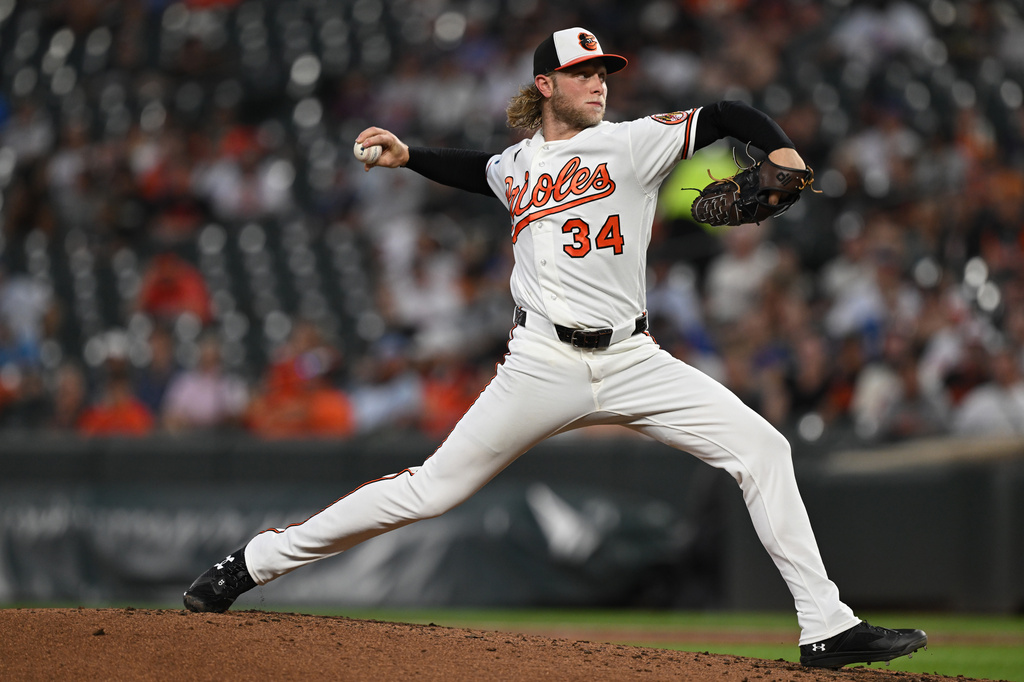 Baltimore Orioles pitcher Shane Baz (34) delivers a pitch against the Chicago Cubs in the third inning of a MLB baseball game on Tuesday, July 7, 2026 in Baltimore, Md. (AP Photo/Gail Burton)