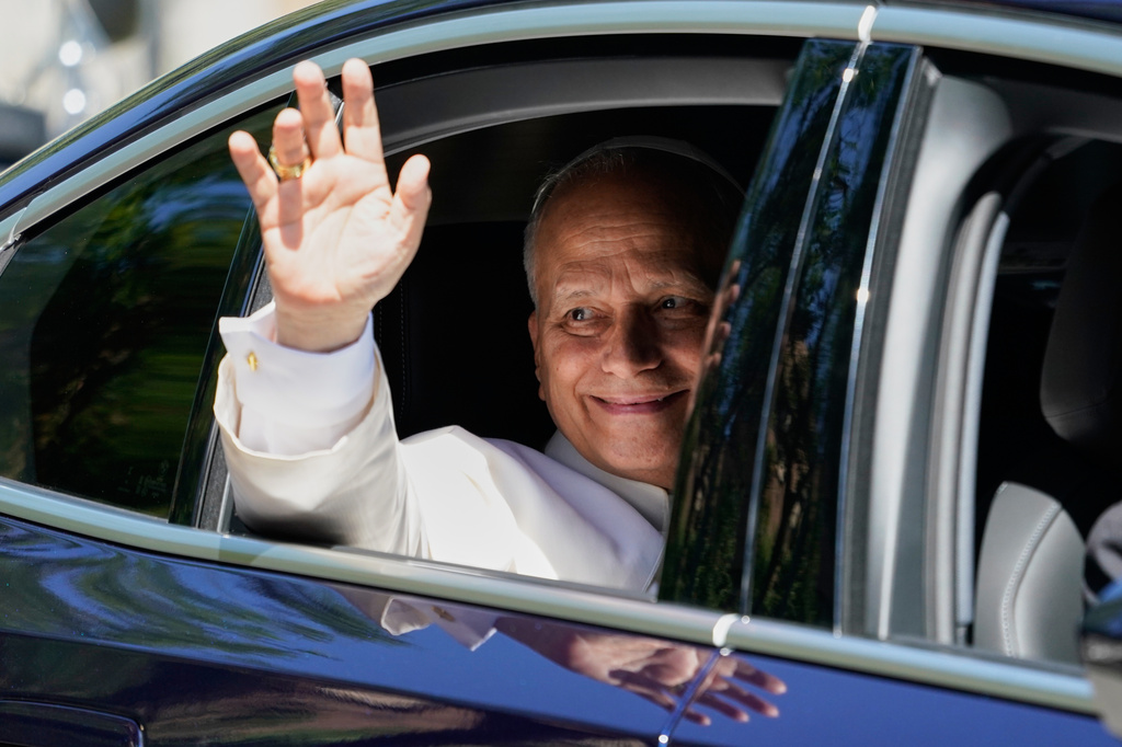 Pope Leo XIV waves in Madrid, Spain, Monday, June 8, 2026. (AP Photo/Andrea Comas)