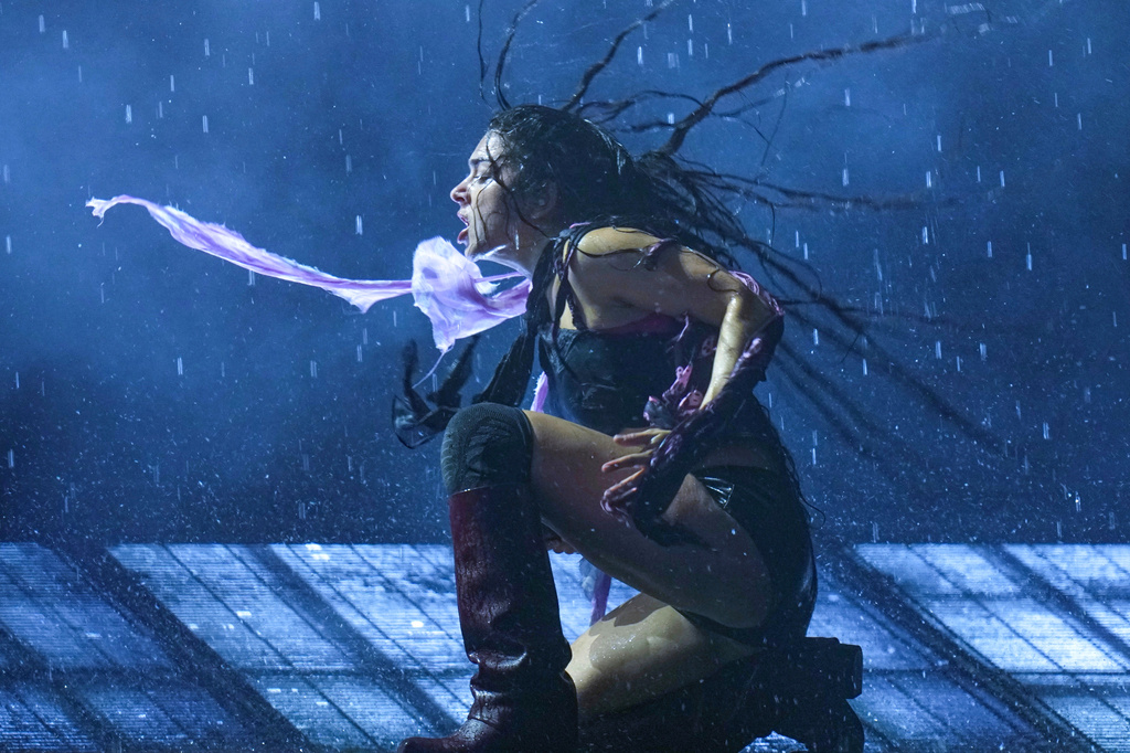 FILE - Charli xcx performs at the Glastonbury Festival in Somerset, England on June 28, 2025. (Scott A Garfitt/Invision/AP, File)