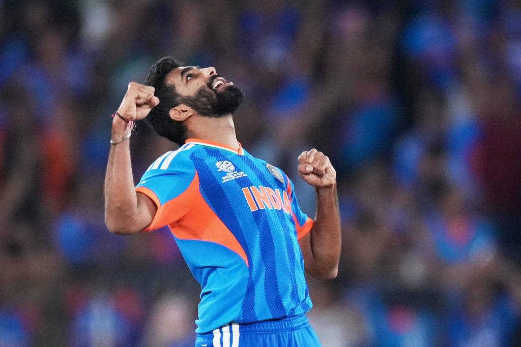 India's Jasprit Bumrah celebrates the wicket of New Zealand's Matt Henry during the T20 World Cup cricket final match between India and New Zealand in Ahmedabad, India, Sunday, March 8, 2026. (AP Photo/Ajit Solanki)