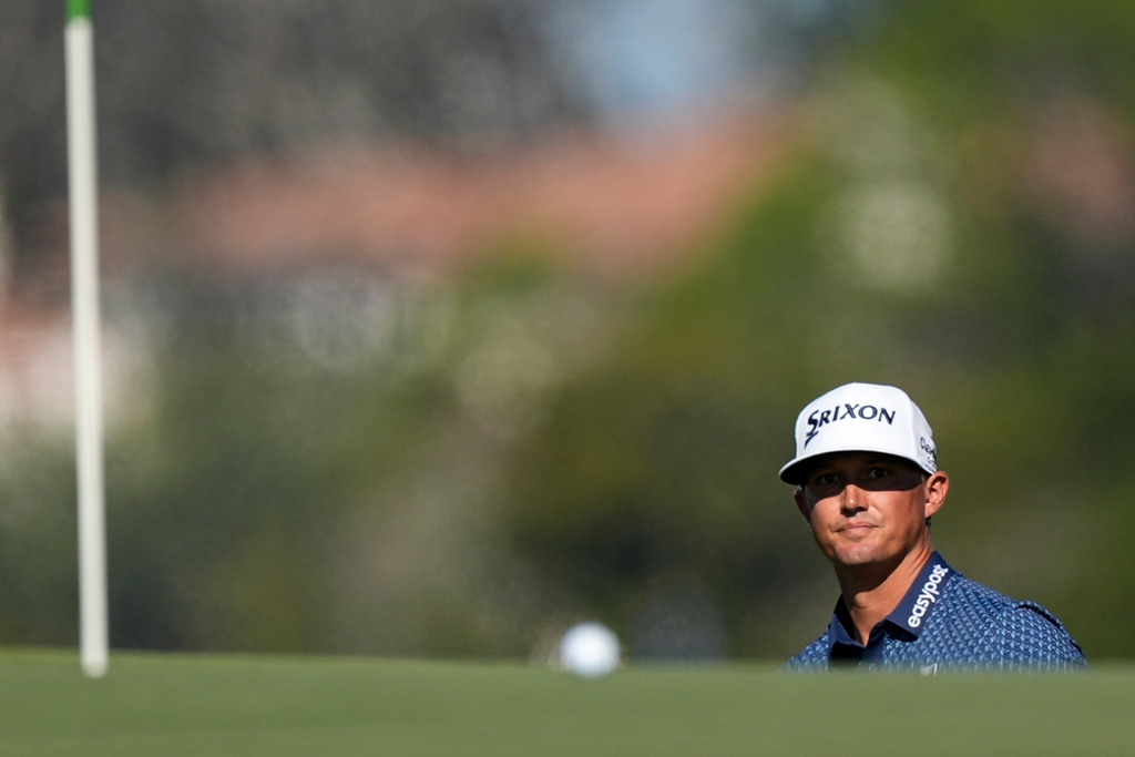 Max McGreevy views his ball on the first green during the final round of the RSM Classic golf tournament, Sunday, Nov. 23, 2025, in St. Simons Island, Ga. (AP Photo/Mike Stewart)