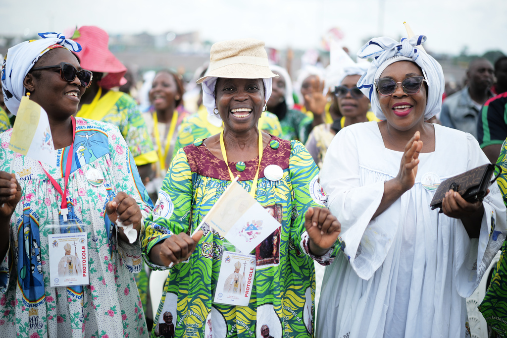 Faithful attend a Mass celebrated by Pope Leo XIV in the Japoma Stadium, in Douala, Cameroon, Friday, April 17, 2026 on the fifth day of his 11-day pastoral visit to Africa. (AP Photo/Andrew Medichini)