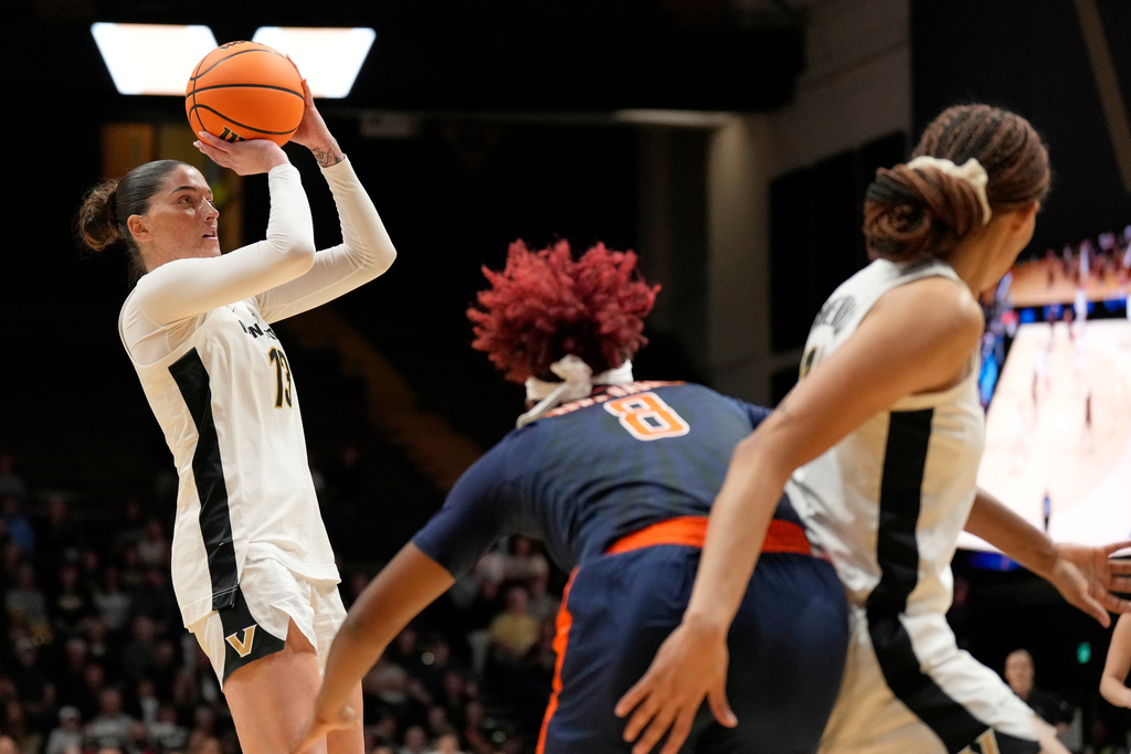 Vanderbilt guard Justine Pissott (13) shoots the ball during the first half in the second round of the NCAA college basketball tournament against Illinois, Monday, March 23, 2026, in Nashville, Tenn. (AP Photo/George Walker IV)