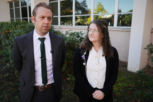 Animal rights activist Zoe Rosenberg, right, who is on trial for taking four chickens from one of Perdue Farms' major poultry plants, stands next to her attorney Chris Carraway outside Sonoma County Superior Court in Santa Rosa, Calif. on Tuesday, Oct. 28, 2025. (AP Photo/Terry Chea) Animal rights activist Zoe Rosenberg, right, who is on trial for taking four chickens from one of Perdue Farms' major poultry plants, stands next to her attorney Chris Carraway outside Sonoma County Superior Court in Santa Rosa, Calif. on Tuesday, Oct. 28, 2025. (AP Photo/Terry Chea)