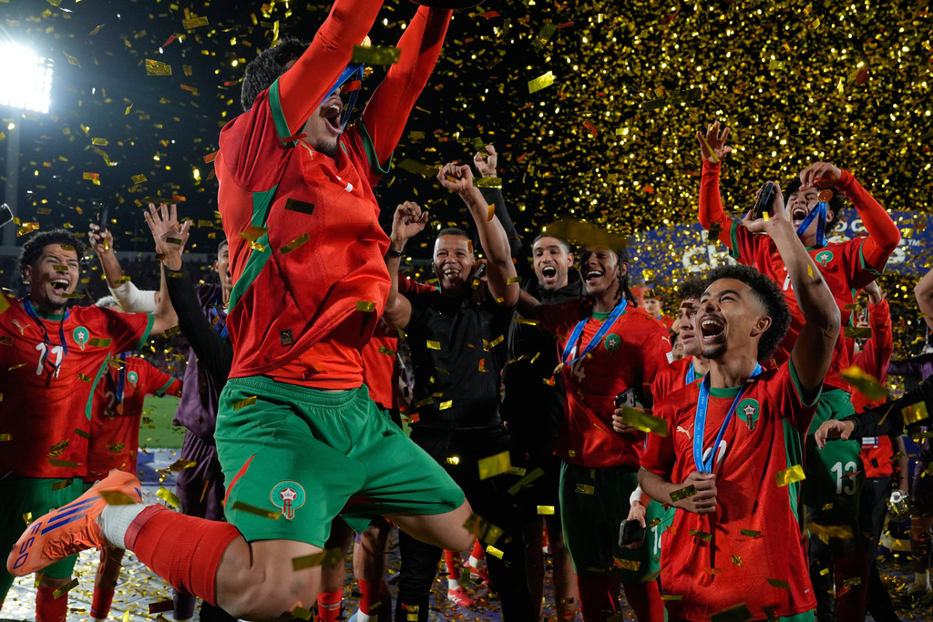 FILE - Morocco players celebrate after defeating Argentina in the FIFA U-20 World Cup final soccer match in Santiago, Chile, Oct. 19, 2025. (AP Photo/Matias Delacroix, File)