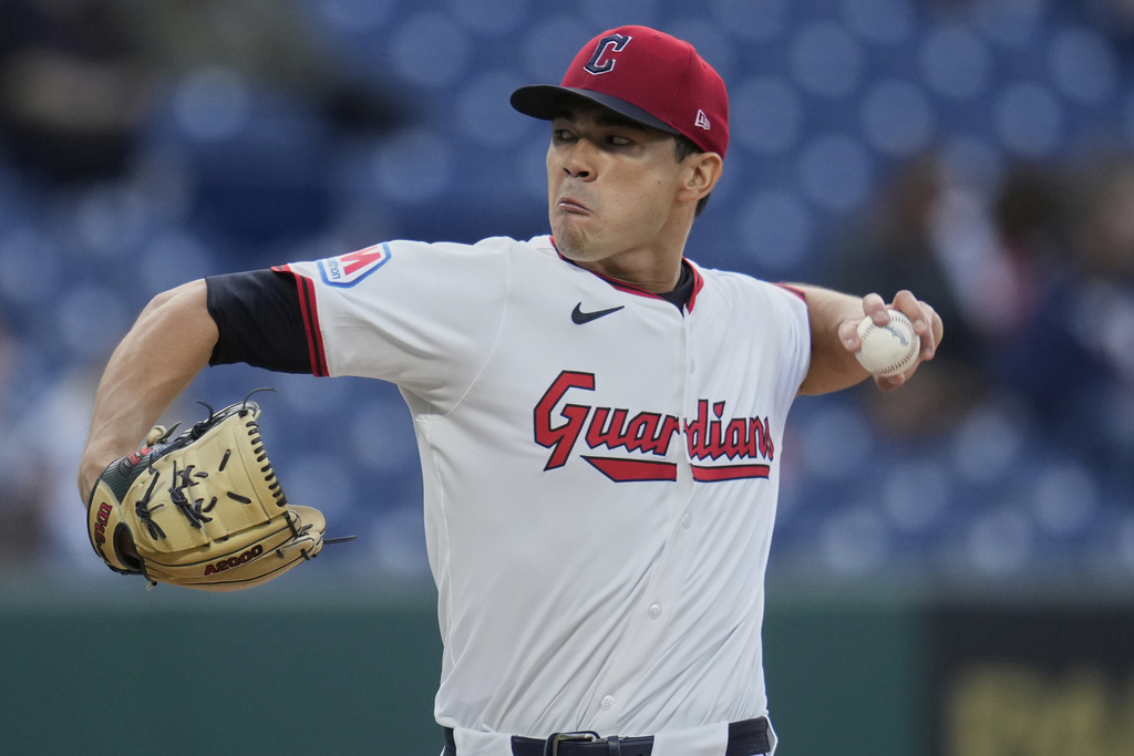 Cleveland Guardians' Joey Cantillo pitches in the first inning of a baseball game against the Kansas City Royals in Cleveland, Tuesday, Sept. 9, 2025. (AP Photo/Sue Ogrocki)