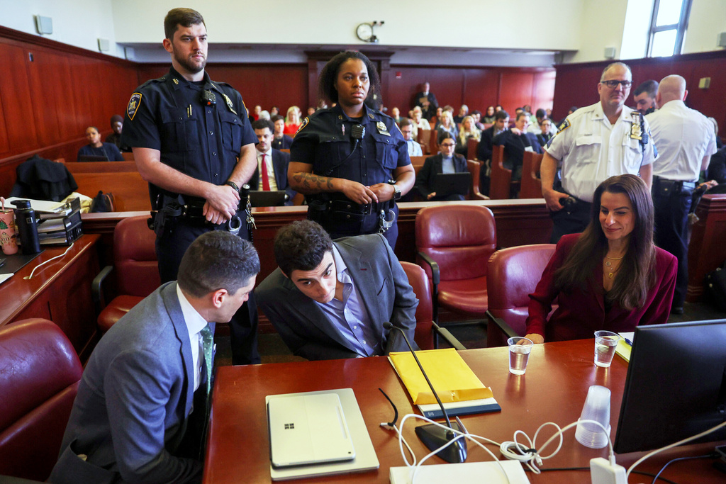 Luigi Mangione appears in Manhattan Criminal Court, Monday, Dec. 8, 2025, in New York. (Sarah Yenesel/Pool Photo via AP)