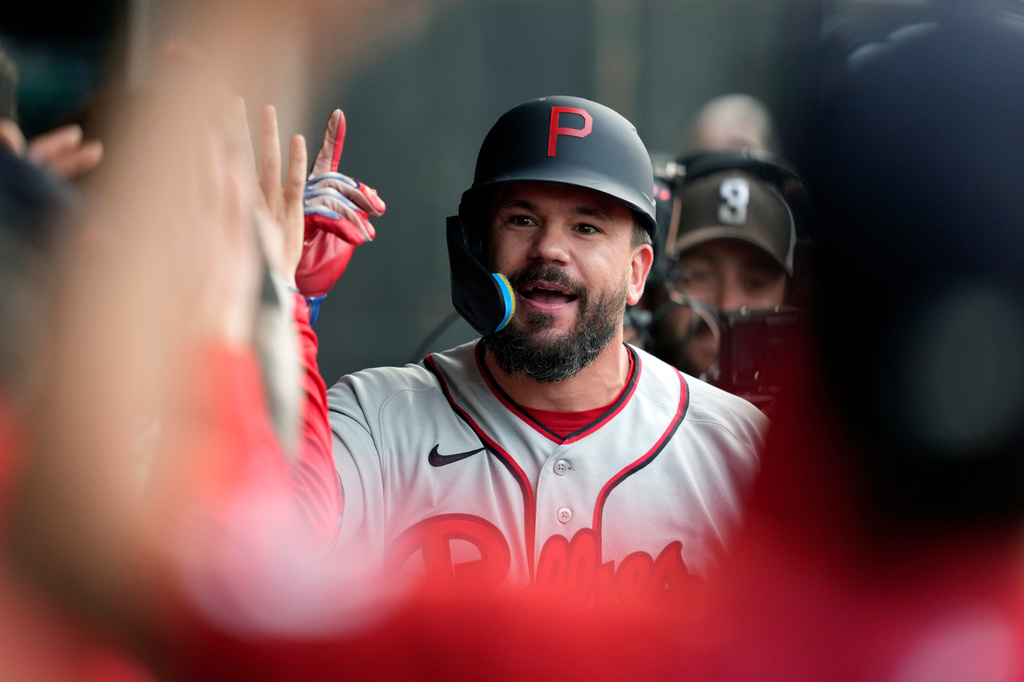 Philadelphia Phillies' Kyle Schwarber celebrates after hitting a home run during the first inning of a baseball game against the Minnesota Twins at the Field of Dreams movie site, Thursday, Aug. 13, 2026, in Dyersville, Iowa. (AP Photo/Charlie Neibergall)
