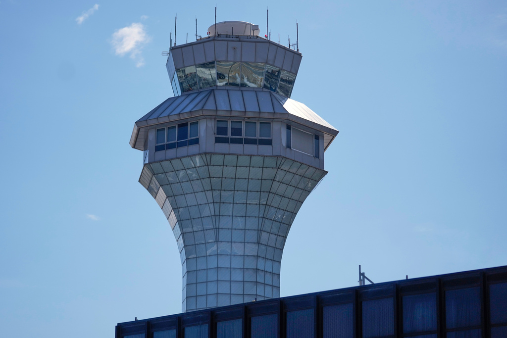 An air traffic control tower is seen at O'Hare International Airport, Monday, Nov. 10, 2025, in Chicago. (AP Photo/Erin Hooley)