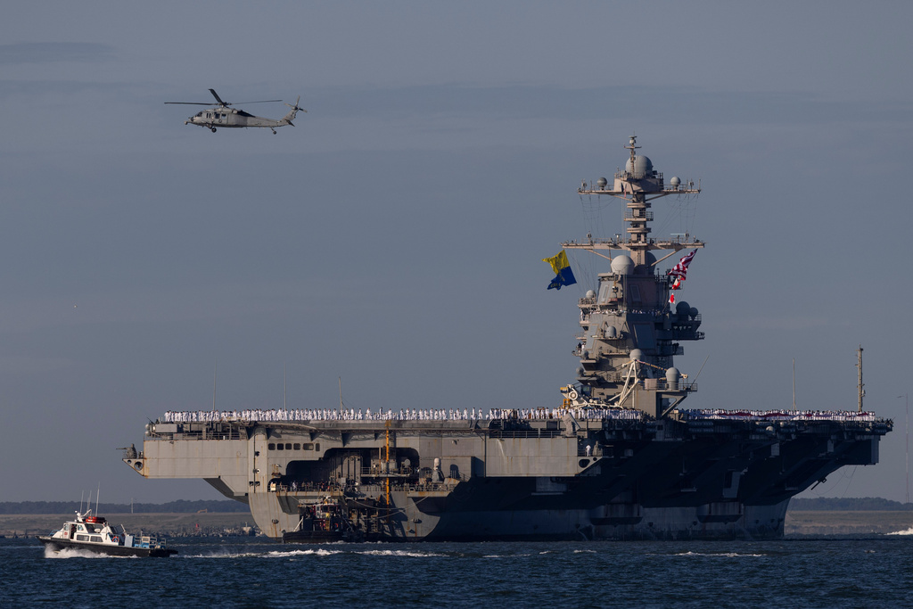 The USS Gerald R. Ford heads toward port at Naval Station Norfolk, as seen from Fort Monroe, Va., on May 16, 2026. (Peter Casey/The Virginian-Pilot via AP)