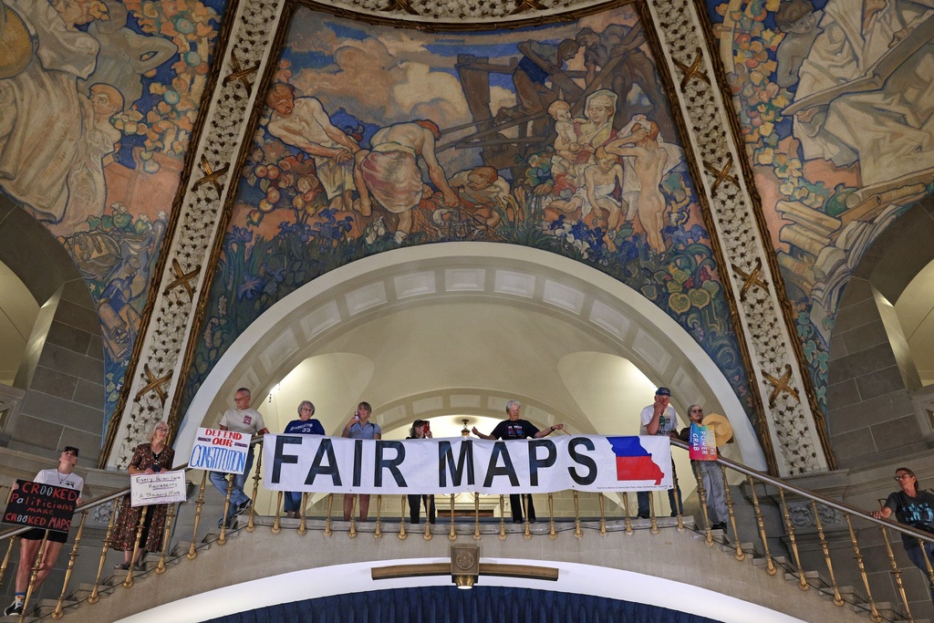People opposed to a plan to redraw Missouri's U.S. House districts gather at the state Capitol in Jefferson City, Mo. on Wednesday, Sept. 10, 2025. (Christian Gooden/St. Louis Post-Dispatch via AP)