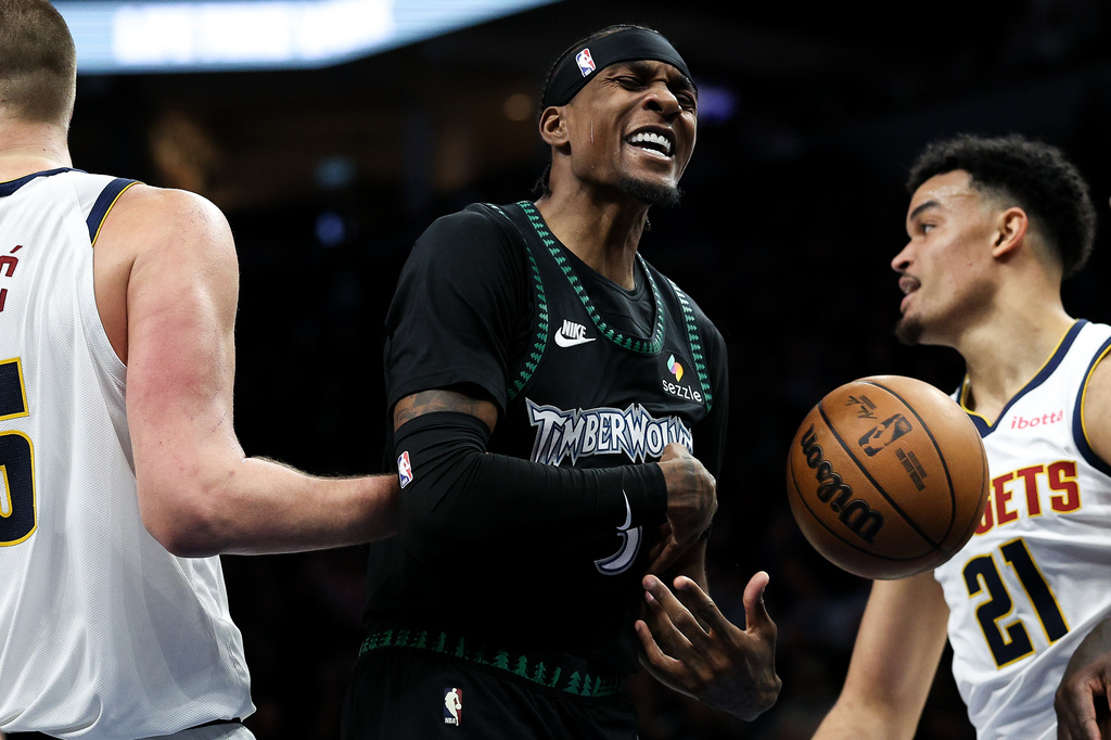Minnesota Timberwolves forward Jaden McDaniels (3) celebrates a basket against the Denver Nuggets during the second half of Game 6 of a first-round NBA basketball playoffs series, Thursday, April 30, 2026, in Minneapolis. (AP Photo/Matt Krohn)