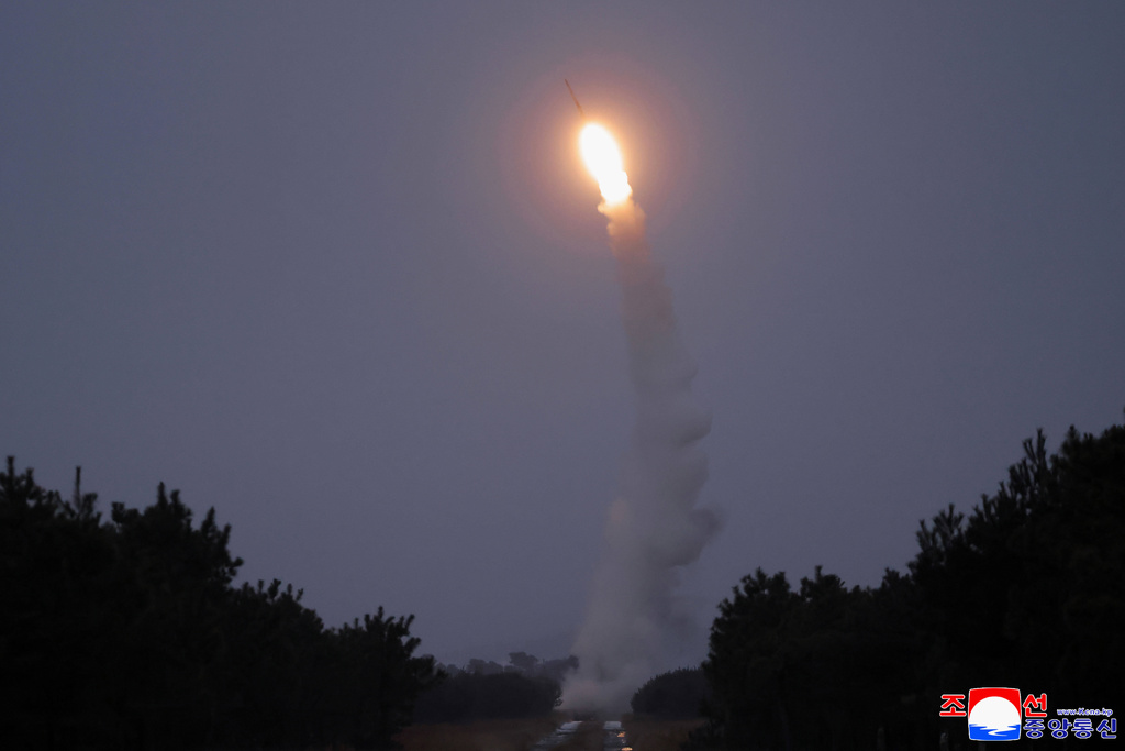 In this photo provided by the North Korean government, a test of a long-range anti-air missile is launched towards its eastern sea, as seen from an undisclosed location in North Korea, Wednesday, Dec. 24, 2025. Independent journalists were not given access to cover the event depicted in this image distributed by the North Korean government. The content of this image is as provided and cannot be independently verified. Korean language watermark on image as provided by source reads: "KCNA" which is the abbreviation for Korean Central News Agency. (Korean Central News Agency/Korea News Service via AP)