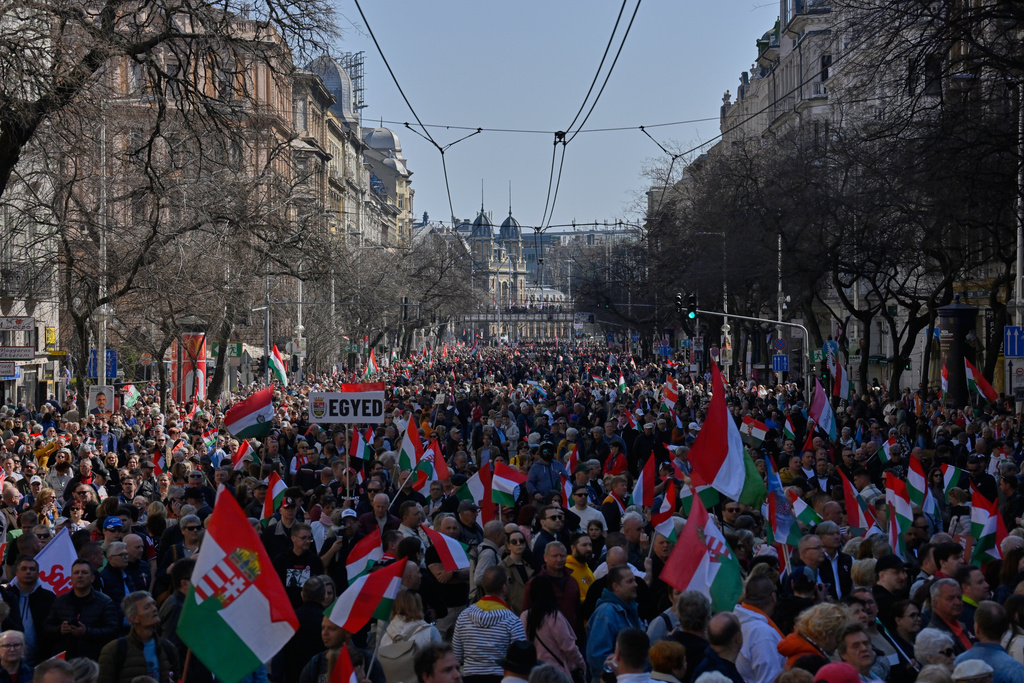 Supporters of Prime Minister Viktor Orban attend a pro-Orban march in Budapest, Hungary, Sunday, March 15, 2026. (AP Photo/Denes Erdos)