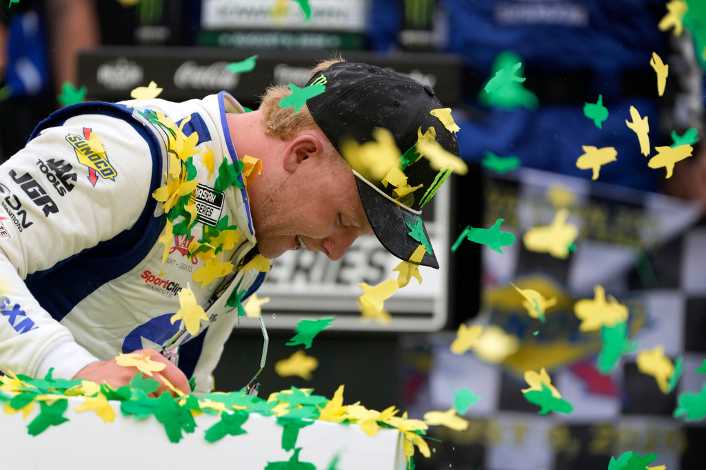 Ty Gibbs celebrates after winning a NASCAR Cup Series auto race, Sunday, Aug. 9, 2026, at Iowa Speedway in Newton, Iowa. (AP Photo/Charlie Neibergall)