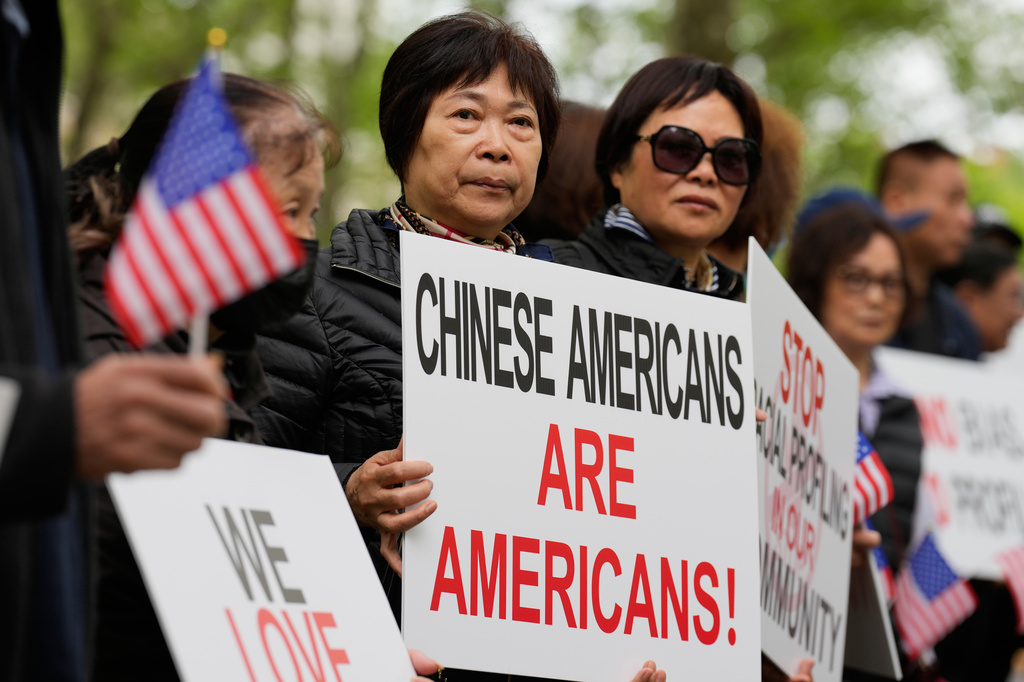 Supporters of Lu Jianwang, also known as Harry Lu, stand outside a federal courthouse before the opening of his trial in New York, Wednesday, May 6, 2026. (AP Photo/Seth Wenig)