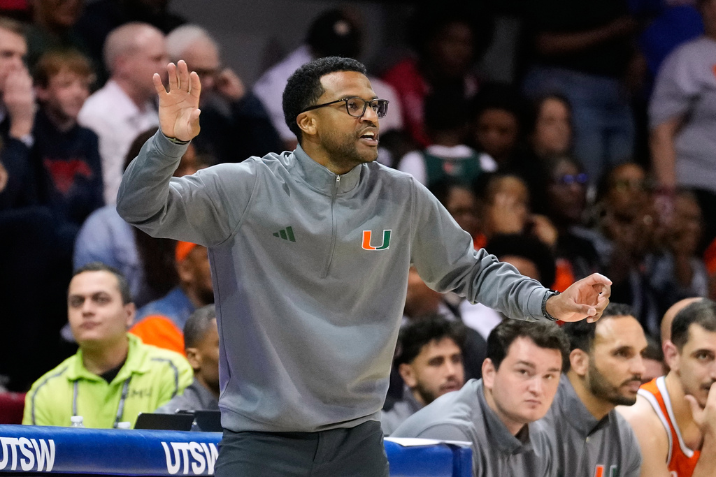 Miami head coach Jai Lucas reacts to play in the second half of an NCAA college basketball game against SMU in Dallas, Wednesday, March 4, 2026. (AP Photo/Tony Gutierrez)