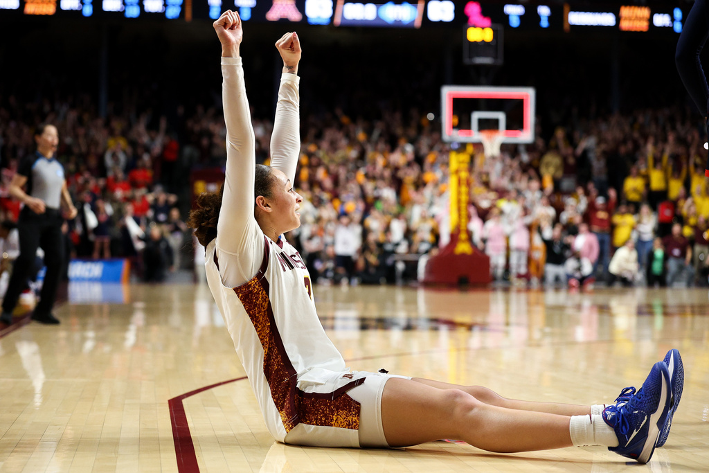 Minnesota guard Amaya Battle celebrates after her winning basket against Mississippi during the second half in the second round of the NCAA college basketball tournament, Sunday, March 22, 2026, in Minneapolis. (AP Photo/Matt Krohn)