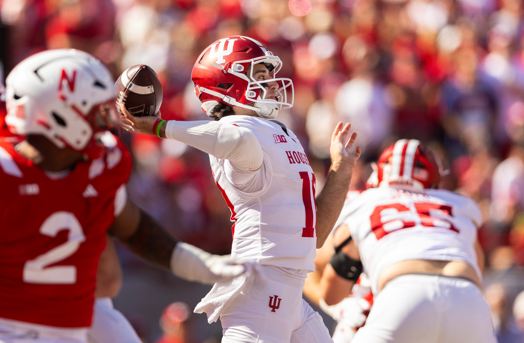 Indiana quarterback Josh Hoover (10) throws a pass during the second half of an NCAA college football game against Nebraska, Saturday, Oct. 10, 2026, in Lincoln, Neb. (AP Photo/Rebecca S. Gratz)