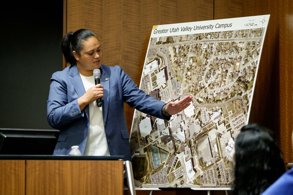 FILE - Sgt. Jennifer Faumuina, of the Utah Department of Public Safety, motions toward a map of the Utah Valley University campus during a preliminary hearing for Tyler Robinson, who is accused in the fatal shooting of Charlie Kirk, at the Fourth District Courthouse in Provo, Utah, July 9, 2026. (AP Photo/Spenser Heaps, Pool, File)