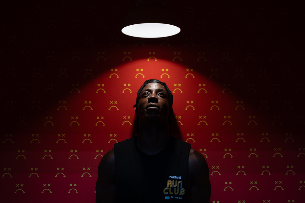 Shaka Smith, a vegan influencer who's politically an independent, poses for a portrait at his fast-food restaurant in Santa Monica, Calif., Thursday, Aug. 6, 2026. (AP Photo/Jae C. Hong)