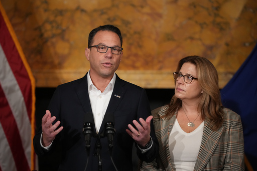 Pennsylvania Gov. Josh Shapiro, accompanied by his wife Lori Shapiro, speaks during a news conference after Cody Balmer plead guilty to attempted murder and other charges, on Tuesday, Oct. 14, 2025 in Harrisburg, Pa. (AP Photo/Matt Slocum) Pennsylvania Gov. Josh Shapiro, accompanied by his wife Lori Shapiro, speaks during a news conference after Cody Balmer plead guilty to attempted murder and other charges, on Tuesday, Oct. 14, 2025 in Harrisburg, Pa. (AP Photo/Matt Slocum)