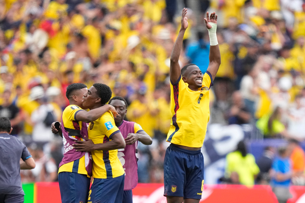 Ecuador players celebrate at the end of the World Cup Group E soccer match between Ecuador and Germany in East Rutherford, N.J., near New York, Thursday, June 25, 2026. (AP Photo/Frank Franklin II)