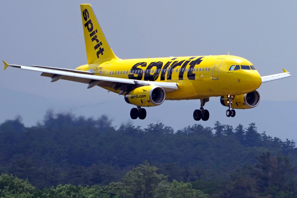 FILE - A Spirit Airlines 319 Airbus approaches Manchester Boston Regional Airport for a landing, June 2, 2023, in Manchester, N.H. (AP Photo/Charles Krupa, File)