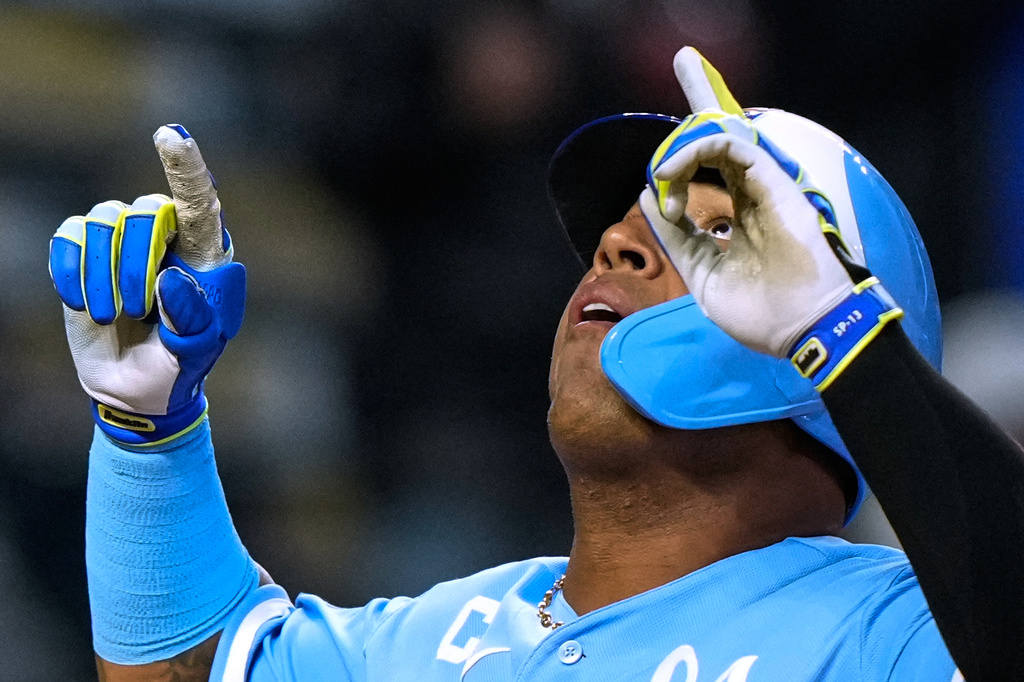 Kansas City Royals' Salvador Perez celebrates after hitting a solo home run during the sixth inning in the second baseball game of a doubleheader against the Milwaukee Brewers, Saturday, April 4, 2026, in Kansas City, Mo. (AP Photo/Charlie Riedel)