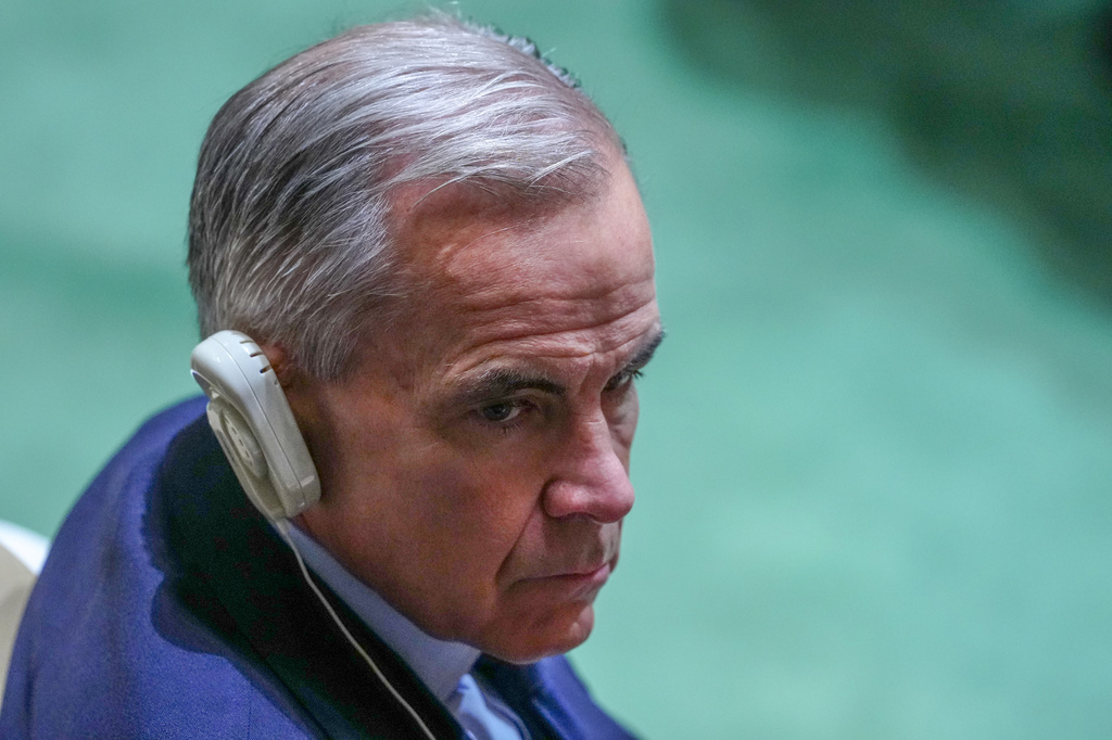 Canada's Prime Minister Mark Carney waits to listen to President Donald Trump speak to the United Nations General Assembly, Tuesday, Sept. 22, 2026, at the UN headquarters. (AP Photo/Julia Demaree Nikhinson)