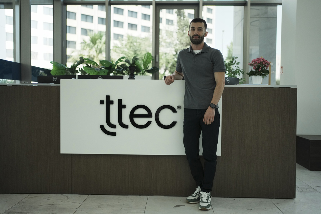 Armen Kirakosian, Global Senior Manager, Learning & Development TTEC poses in Athens, Greece, Thursday, Aug. 21, 2025. (AP Photo/Thanassis Stavrakis)