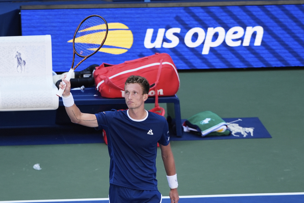 Jiri Lehecka, of the Czech Republic, reacts after defeating Adrian Mannarino, of France, during the fourth round of the U.S. Open tennis championships, Sunday, Aug. 31, 2025, in New York. (AP Photo/Pamela Smith)