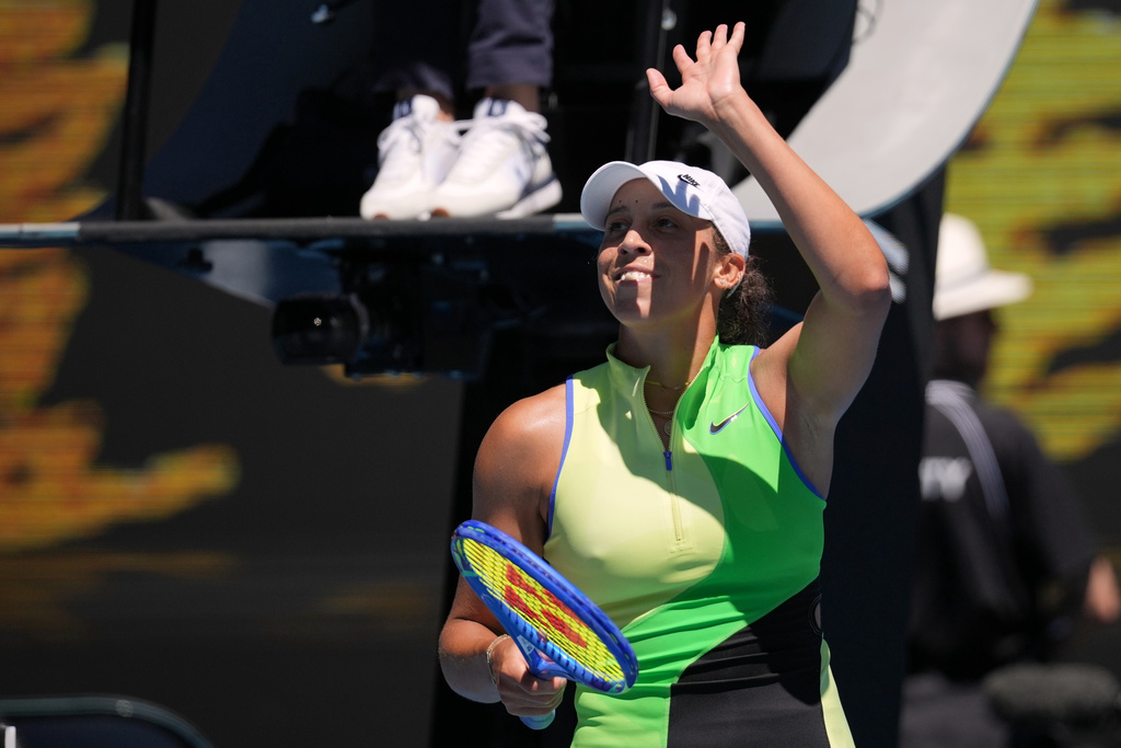 Madison Keys of the U.S. waves after defeating Karolina Pliskova of the Czech Republic in their third round match at the Australian Open tennis championship in Melbourne, Australia, Saturday, Jan. 24, 2026. (AP Photo/Dita Alangkara)