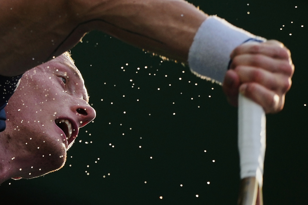 Jiri Lehecka, of the Czech Republic serves against Denis Shapovalov, of Canada during the men's singles match of the Shanghai Masters tennis tournament at Qizhong Forest Sports City Tennis Center, in Shanghai, China, Monday, Oct. 6, 2025. (AP Photo/Andy Wong)
