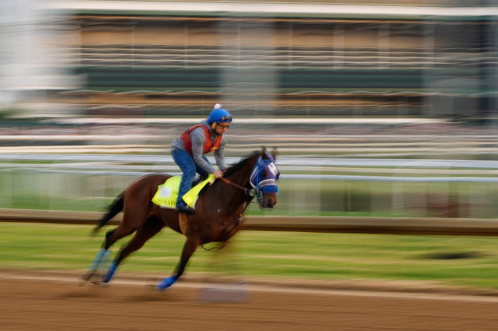 Kentucky Derby entrant So Happy works out at Churchill Downs Monday, April 27, 2026, in Louisville, Ky. (AP Photo/Charlie Riedel)