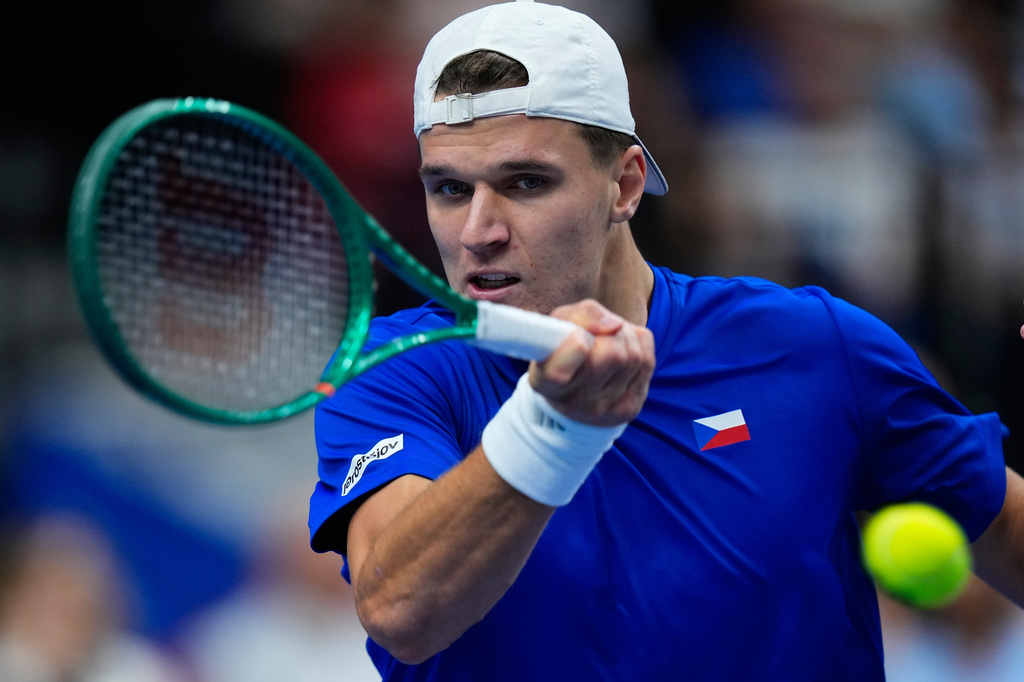 Czechia's Jakub Mensik returns the ball to United States' Learner Tien during the Davis Cup second round qualifier match between the Czech Republic and the United States, in Prague, Friday, Sept. 18, 2026. (AP Photo/Petr David Josek)